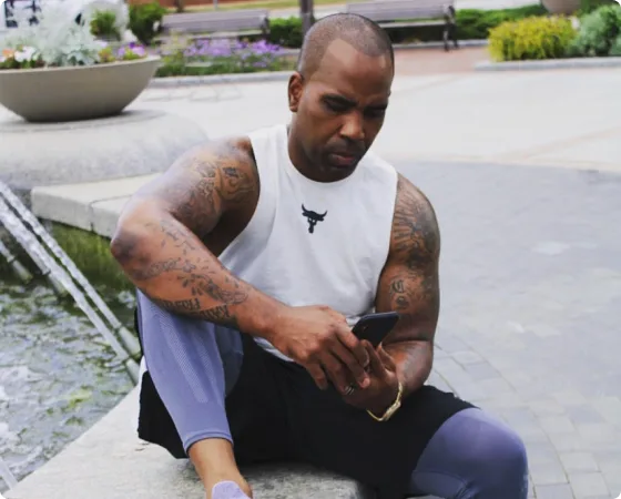 Marques Ogden reflecting outdoors